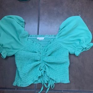 Light green crop top scrunchable and puff sleeves